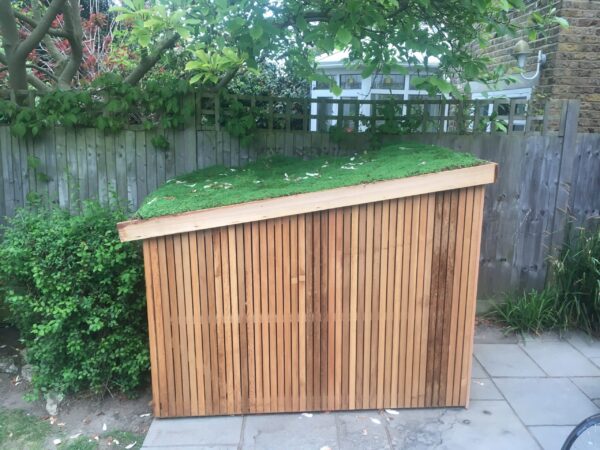 Bike shed with a living green roof, featured in a Brighton Bike Sheds news update